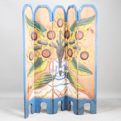 Lot 399 - An Indonesian carved and painted four fold...