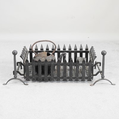Lot 260 - A cast iron fire grate