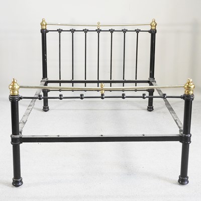 Lot 322 - An early 20th century brass and iron bedframe