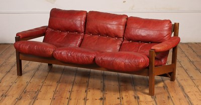 Lot 497 - A Danish red leather upholstered three seater...