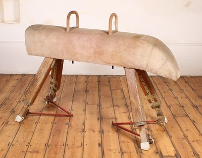 Lot 477 - A 20th century pitch pine gymnasium pommel horse