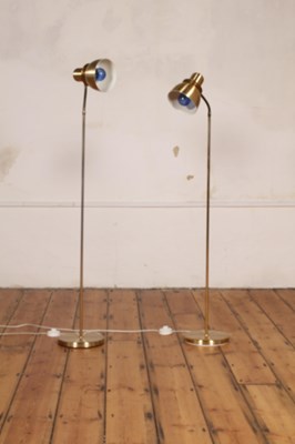 Lot 635 - A pair of modern brass-effect standard lamps