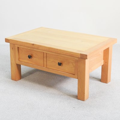 Lot 528 - A modern light oak coffee table, with a single...