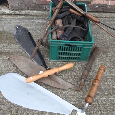 Lot 524 - A collection of horse hames and hand tools