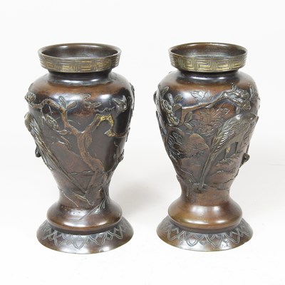 Lot 199 - A pair of early 20th century Japanese bronze...