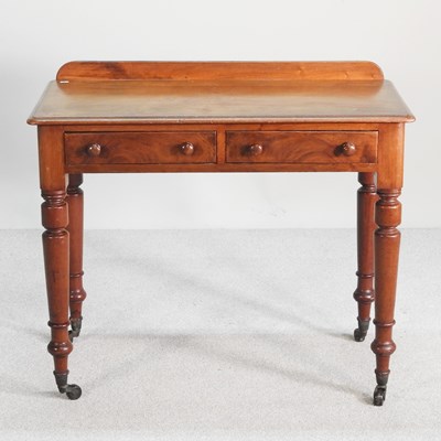 Lot 304 - A Victorian mahogany side table, containing a...