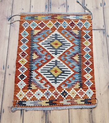 Lot 511 - A Persian kilim, with two central diamonds, 86...