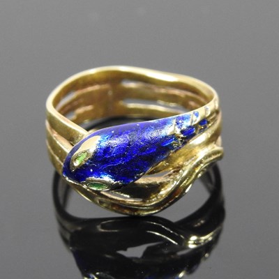 Lot 64 - An 18 carat gold and blue enamelled snake ring,...