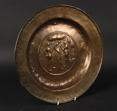 Lot 102 - A 16th/17th century Nuremberg brass alms dish,...