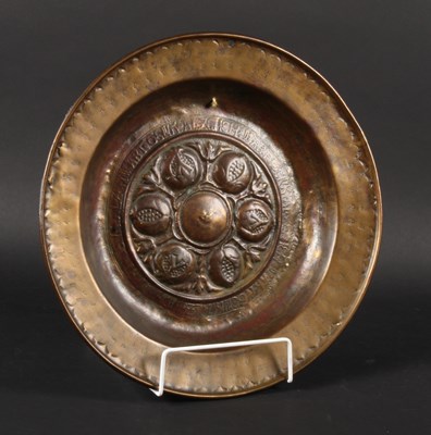 Lot 105 - A 16th/17th century Nuremberg brass alms dish,...