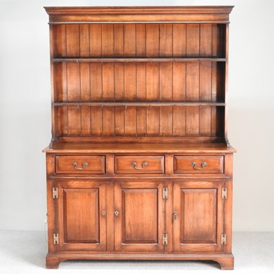 Lot 434 - An 18th century style oak dresser, 20th...