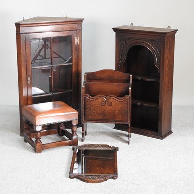 Lot 284 - An oak hanging book shelf, 51cm wide, together...