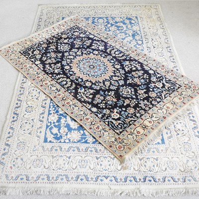 Lot 292 - A modern keshan carpet, with scrolling designs...