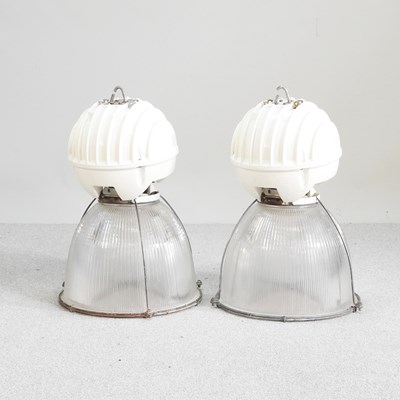 Lot 176 - A pair of large holophane style glass light...