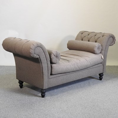 Lot 519 - A dark grey upholstered scroll end window seat