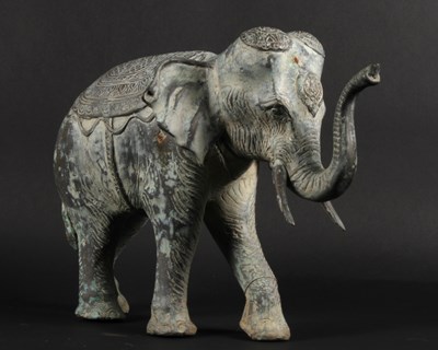 Lot 113 - A Khmer style verdigris bronze figure of an...