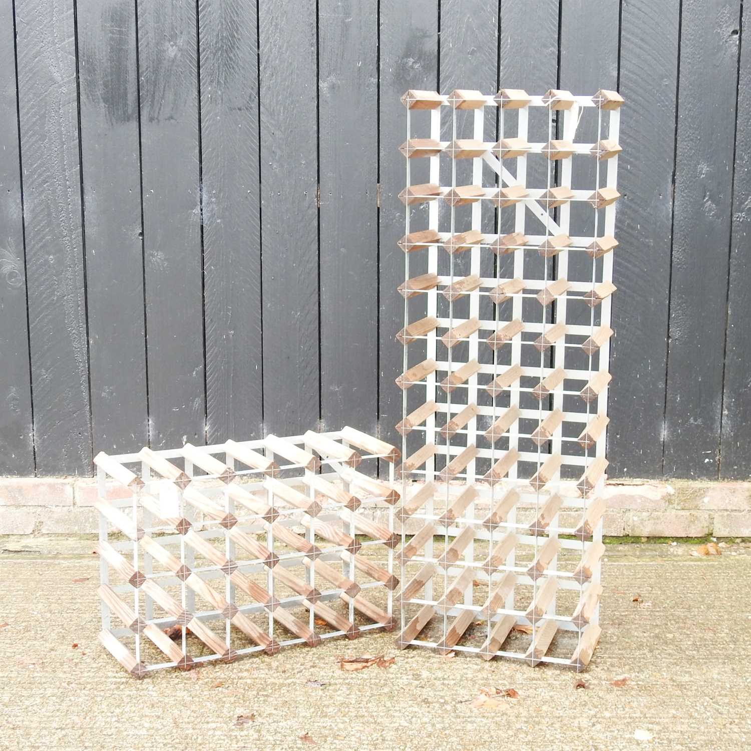 Lot 437 - A wine rack, together with another smaller