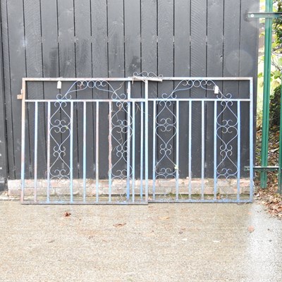 Lot 277 - A pair of blue painted iron garden gates, each...