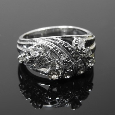 Lot 84 - An 18 carat white gold and diamond cluster...