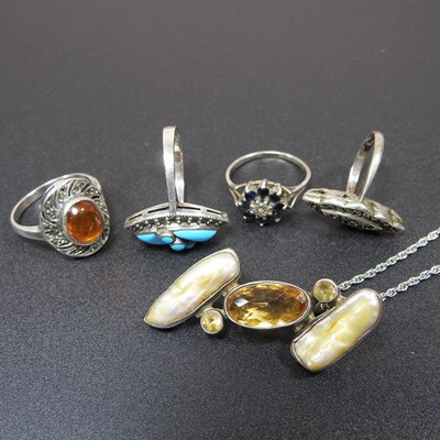 Lot 175 - A collection of four various silver dress...