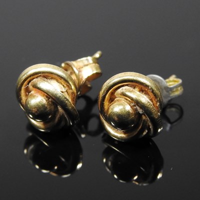 Lot 166 - A pair of 18 carat gold Celtic knot design...