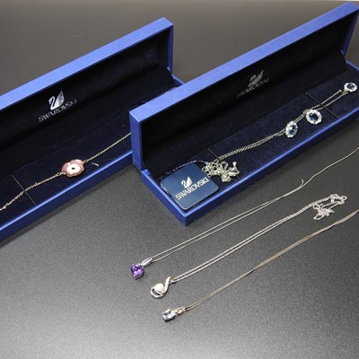 Lot 186 - A Swarovski gilt and enamelled bracelet, boxed,...