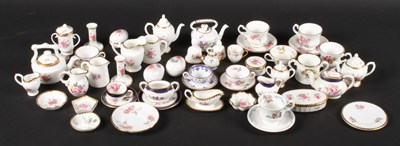 Lot 183 - A collection of miniature tea wares and...
