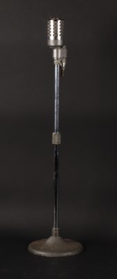 Lot 790 - A 1960s polished metal microphone, on stand