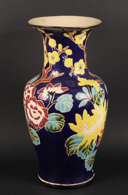 Lot 219 - A Chinese glazed pottery vase