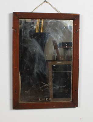 Lot 605 - A railway mirror, inscribed LNER