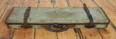Lot 786 - A canvas-bound fitted gun case, green baize...