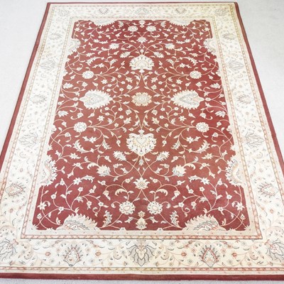 Lot 395 - A modern Afghan chobi rug, with scrolling...