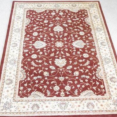 Lot 522 - A modern Afghan Chobi rug, with scrolled...