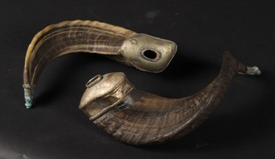 Lot 109 - A pair of white metal mounted ram's horn lamps,...