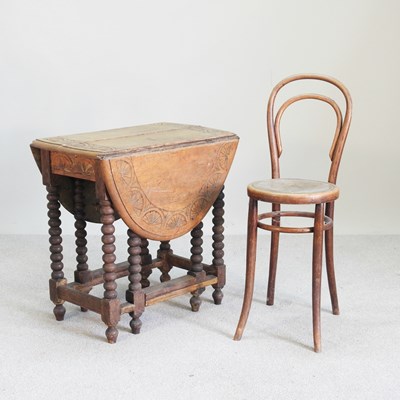 Lot 478 - An early 20th century oak gateleg table, on...