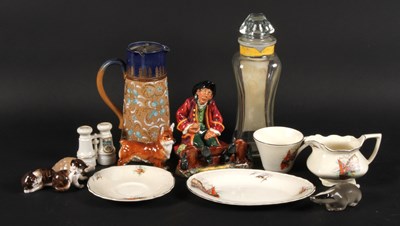 Lot 180 - A Royal Doulton "In the Stocks" figure,...