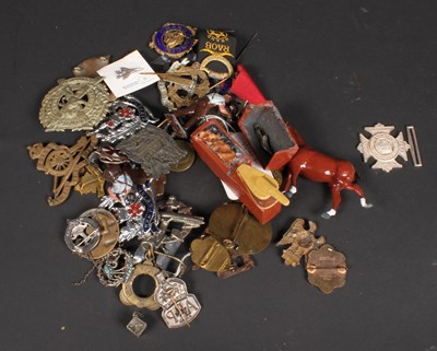 Lot 732 - A collection of medals and cap badges,...
