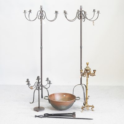Lot 383 - A pair of metal candelabra, 146cm high,...