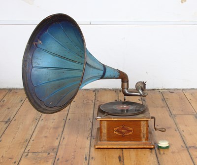 Lot 784 - A vintage gramophone, with a large blue...