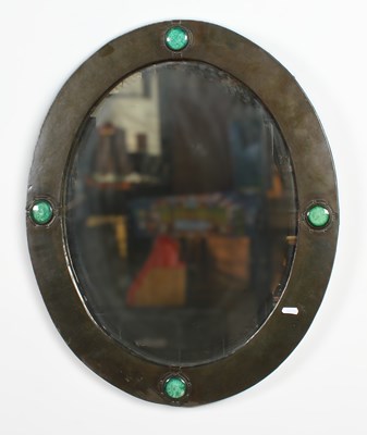 Lot 380 - An Arts & Crafts Liberty & Co copper oval wall...