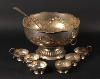 Lot 623 - A silver plated punch bowl, with six goblets...