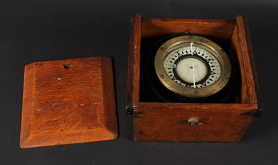 Lot 773 - A brass compass on a gimbal mount, cased