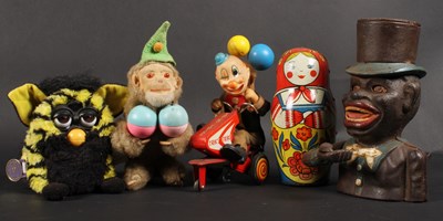 Lot 577 - A collection of vintage toys, including a...