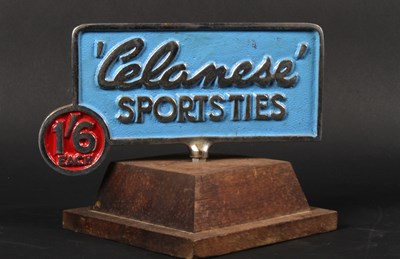 Lot 684 - A cast advertising sign, inscribed Celanese...