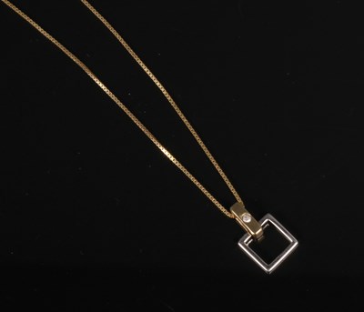 Lot 49 - A 9 carat gold square pendant set with...