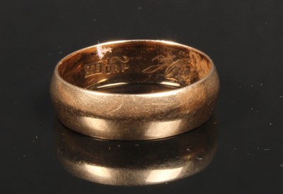 Lot 22 - A 14 carat yellow gold wedding band, size O/P, 4g