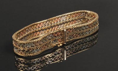 Lot 2 - A 9 carat tri-colour gold bracelet, 30.2g