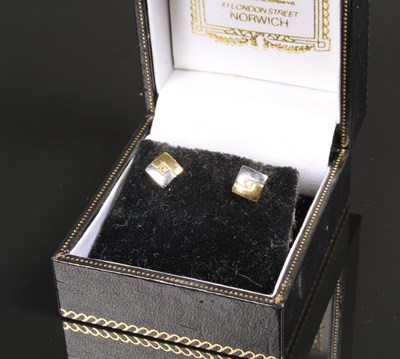 Lot 84 - A pair of 9 carat bi-colour square earrings, 0.8g