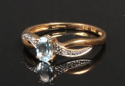Lot 50 - A 9 carat gold aquamarine ring, having pave...