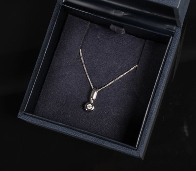 Lot 57 - A 9 carat white gold diamond pendant, 2.5g